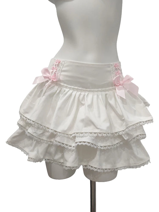 Pink multilayered A-line mini skirt with cute bow details – perfect for girly, doll-like summer outfits
